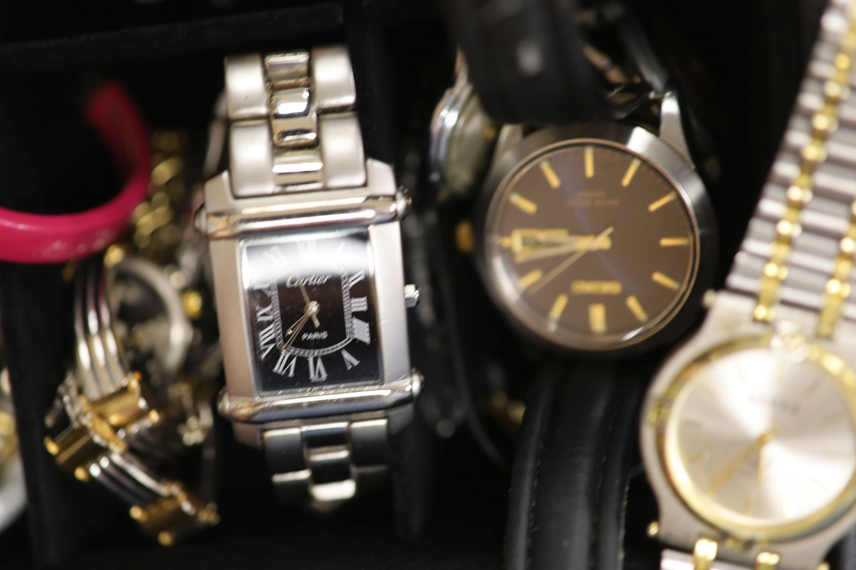 A collection of lady's and gentlemen's quartz and other wristwatches including Seiko.